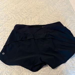 Speed Up Mid-Rise Lined Short 4" size 10 Tall dark navy